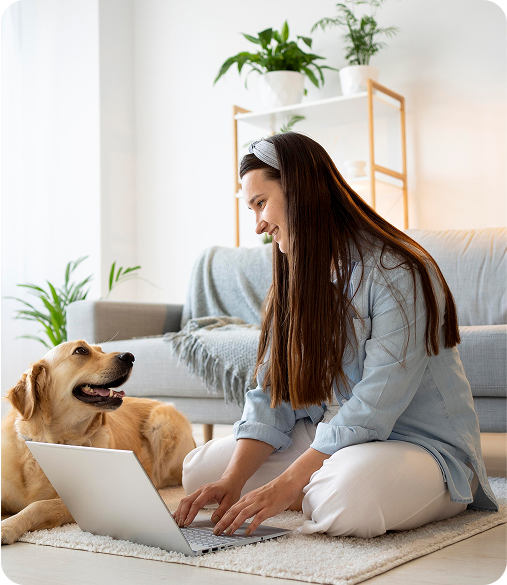 image of a woman sitting with a dog on the floor