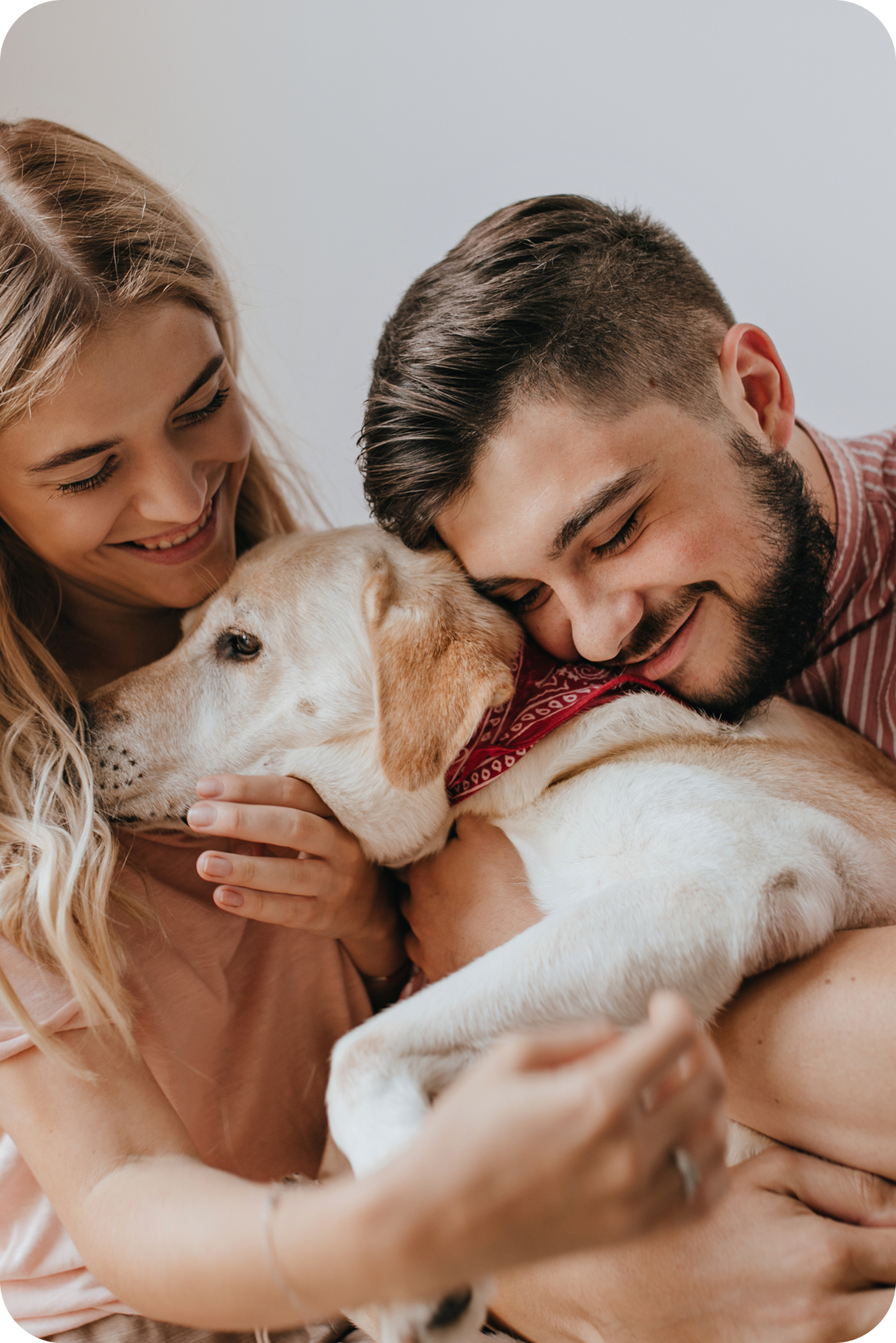 image of a couple hugging a dog